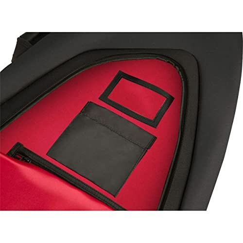 Interior view of a backpack with a red and black pocket design.