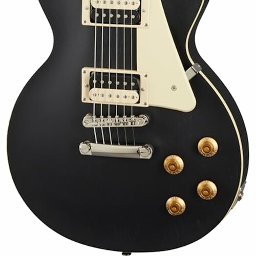 Close-up of a black electric guitar body with pickups and control knobs.