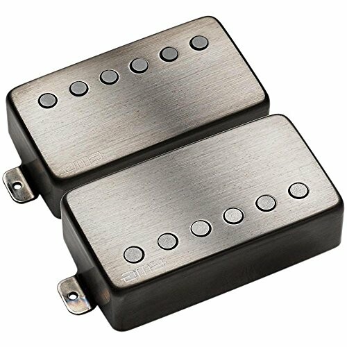 A pair of humbucker guitar pickups with a metallic finish.