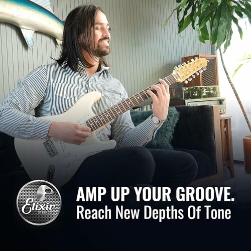 Man playing electric guitar with amp up your groove text.